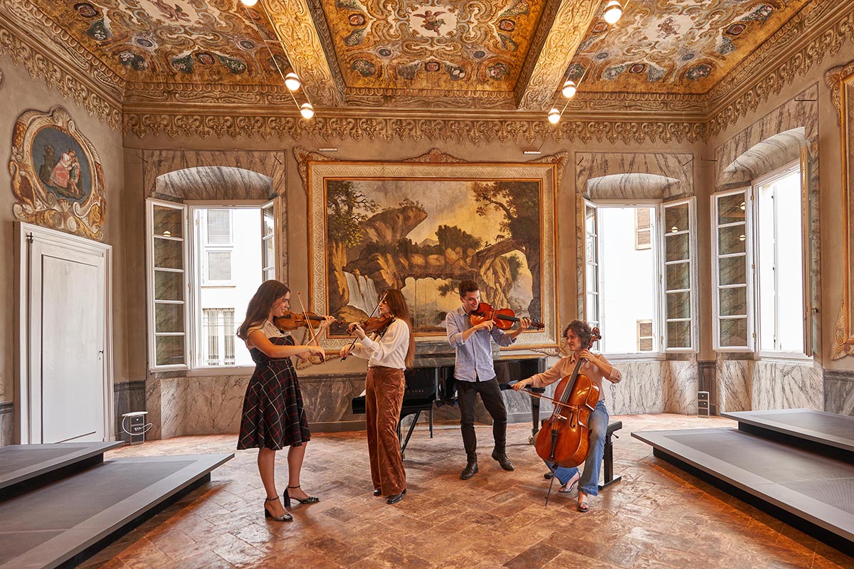 A string quartet plays in the Stradivari Room at the Stauffer Center for Strings